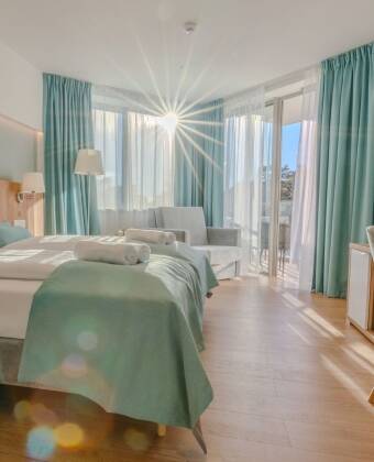 Book one of the stylish and comfortable rooms with a balcony.