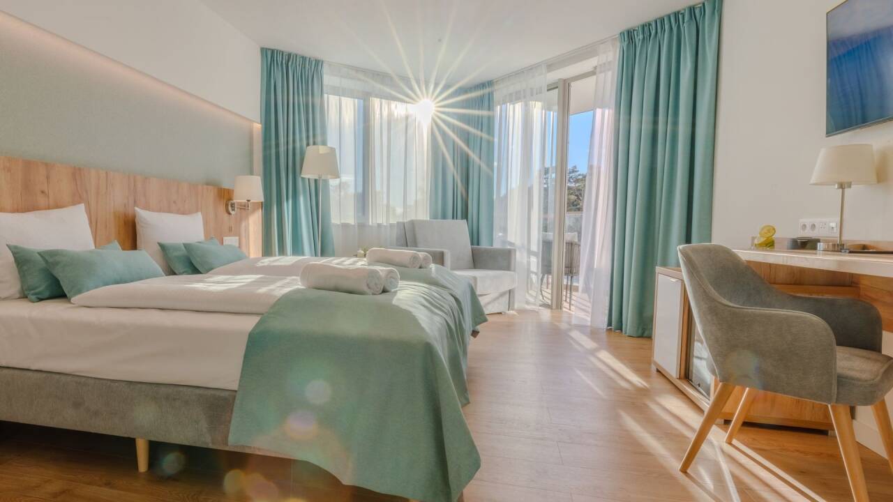 Book one of the stylish and comfortable rooms with a balcony.