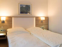 Die Zimmer sind gemütlich eingerichtet und mit allem nötigen Komfort ausgestattet, damit Gäste sich sofort wie zu Hause fühlen.