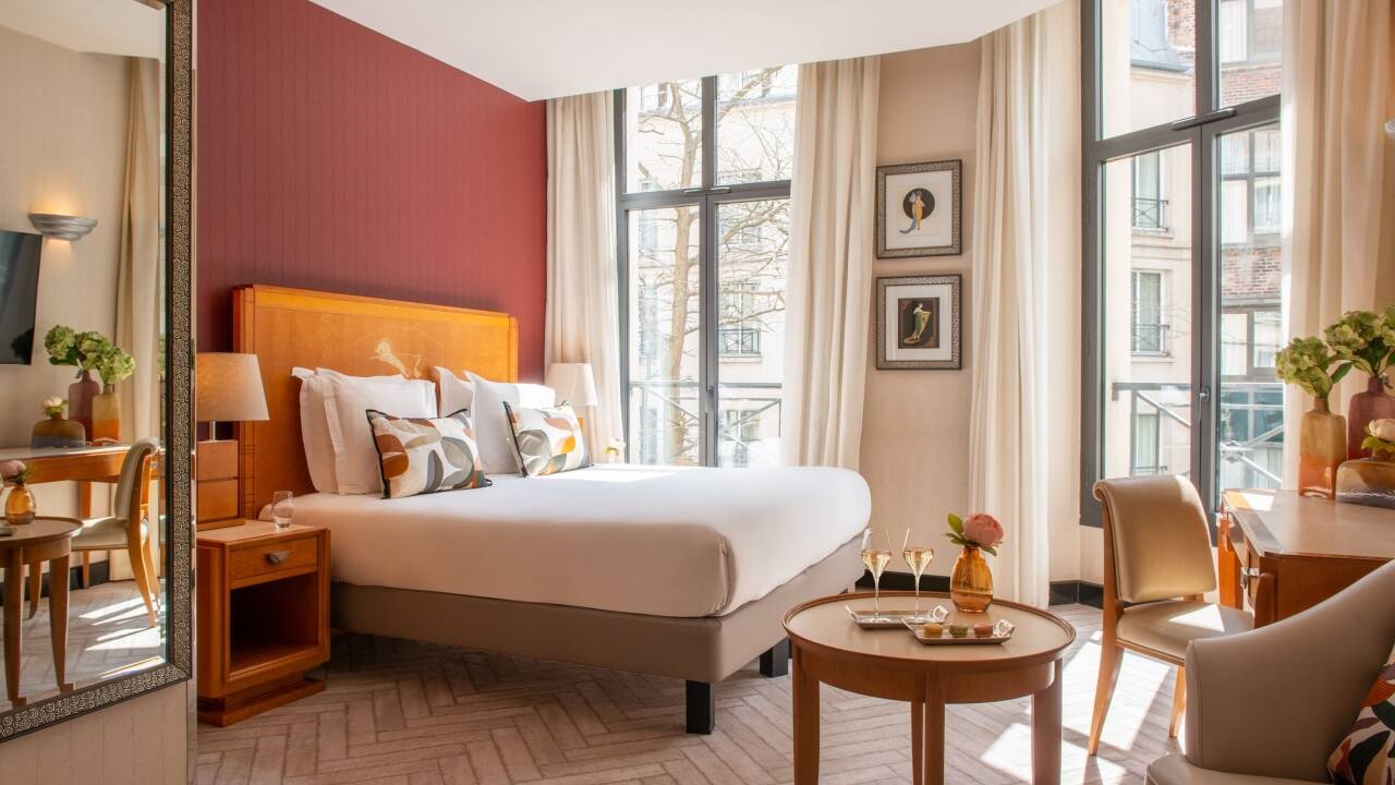 Rooms are modern, well-designed, and inviting—ideal for relaxing after a day spent exploring the streets of Paris.