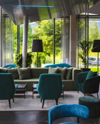 The modern lobby bar is a relaxed spot to enjoy a drink and unwind.
