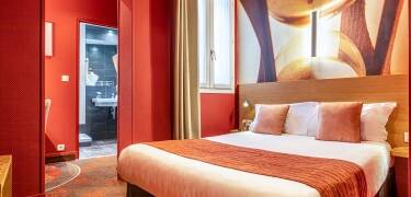 Intimate rooms offer premium bedding and sleek modern bathrooms.