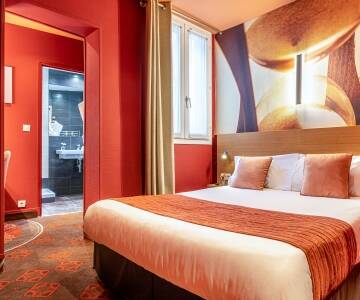 Intime rom med førsteklasses sengetøy og moderne bad.