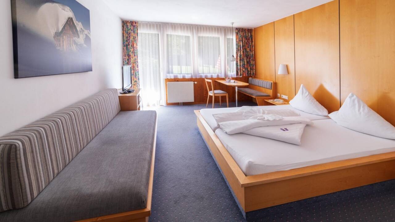 Gemütliche Zimmer bieten eine warme Atmosphäre und komfortable Ausstattung.