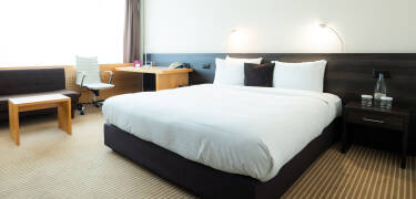 Comfortable modern rooms with premium amenities ensure a relaxing stay.