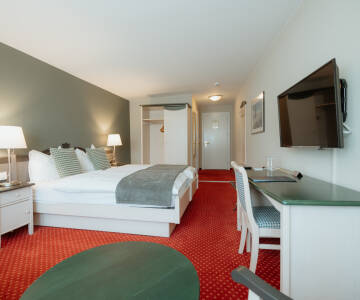 Komfortable værelser giver ro og afslapning efter en dag i naturen.