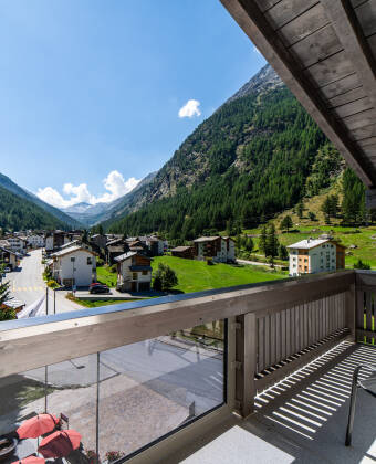 All rooms and apartments feature private balconies with beautiful mountain scenery.