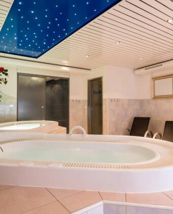 Unwind after an active day with sauna, steam bath, whirlpool, and fitness facilities.