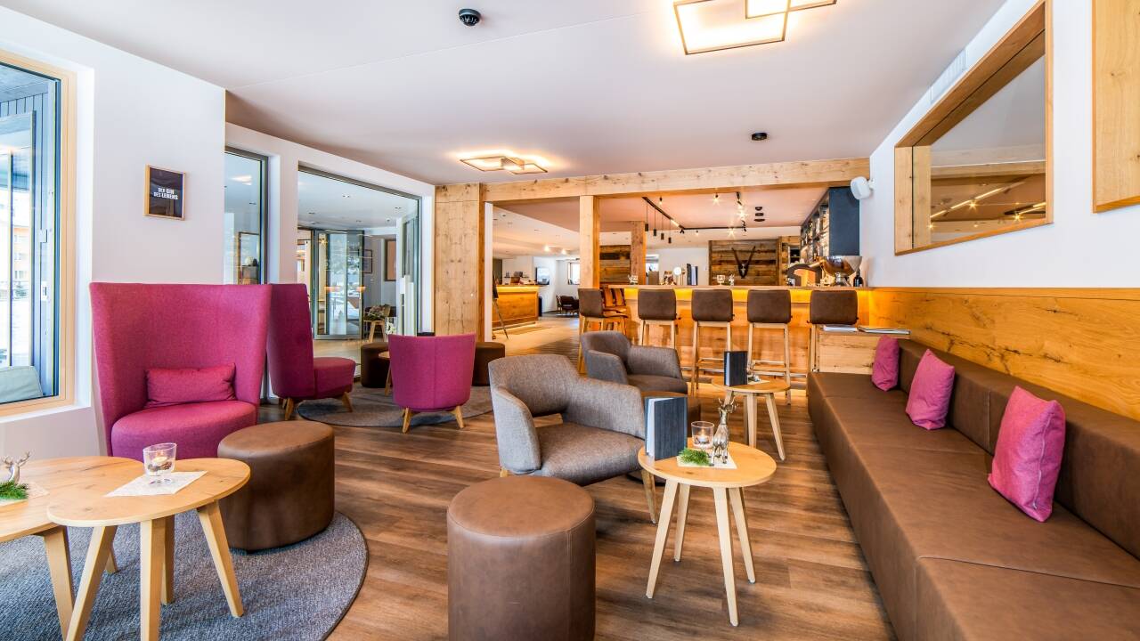 Recently renovated in 2021, the hotel combines modern comfort with natural wood and stone elements.