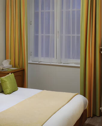 The rooms at the hotel are decorated in a classic French style, providing a cosy and comfortable setting for your stay.