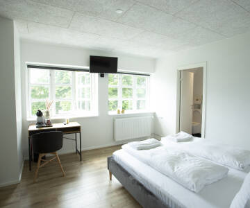 Helle, gut ausgestattete Zimmer bieten alles, was Sie für einen erholsamen Aufenthalt brauchen.