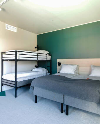 Modern rooms with options for up to four people make the hotel a great choice for friends and families.