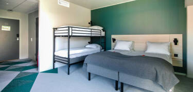 Modern rooms with options for up to four people make the hotel a great choice for friends and families.