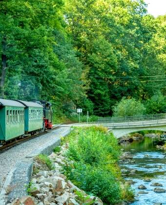 Attractions such as the Erzgebirgische Aussichtsbahn and local railway museums offer memorable experiences.