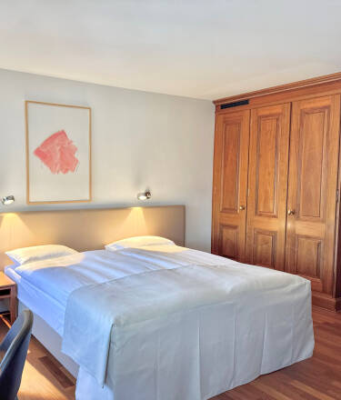 Rooms furnished with quality materials complement the character of this beautifully restored building.