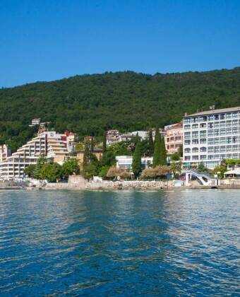 The hotel is located in the heart of Opatija, right along the seaside promenade, making it an excellent base for exploring the city.