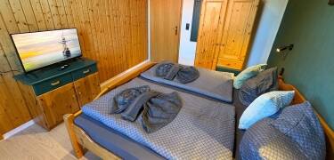 The bright and simply furnished rooms offer modern comfort and a peaceful place to relax.