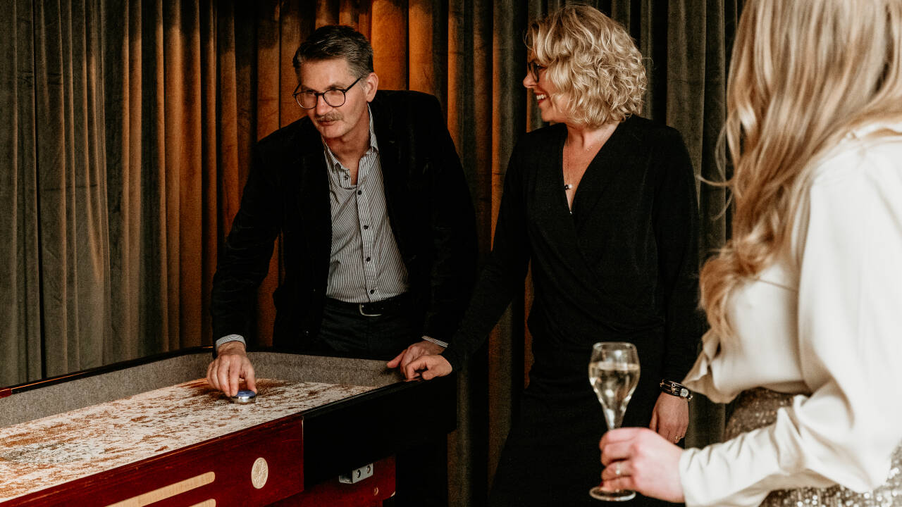 Unwind in the hotel bar and challenge friends to a game.