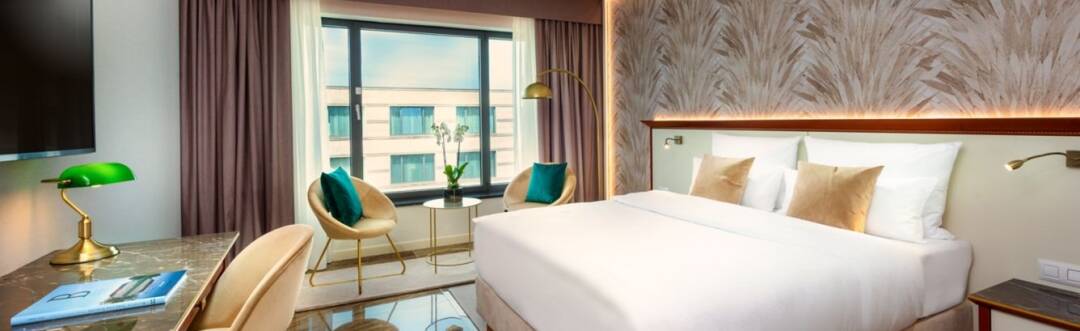 Relax in spacious rooms and suites featuring premium bedding, elegant furnishings and refined comfort.