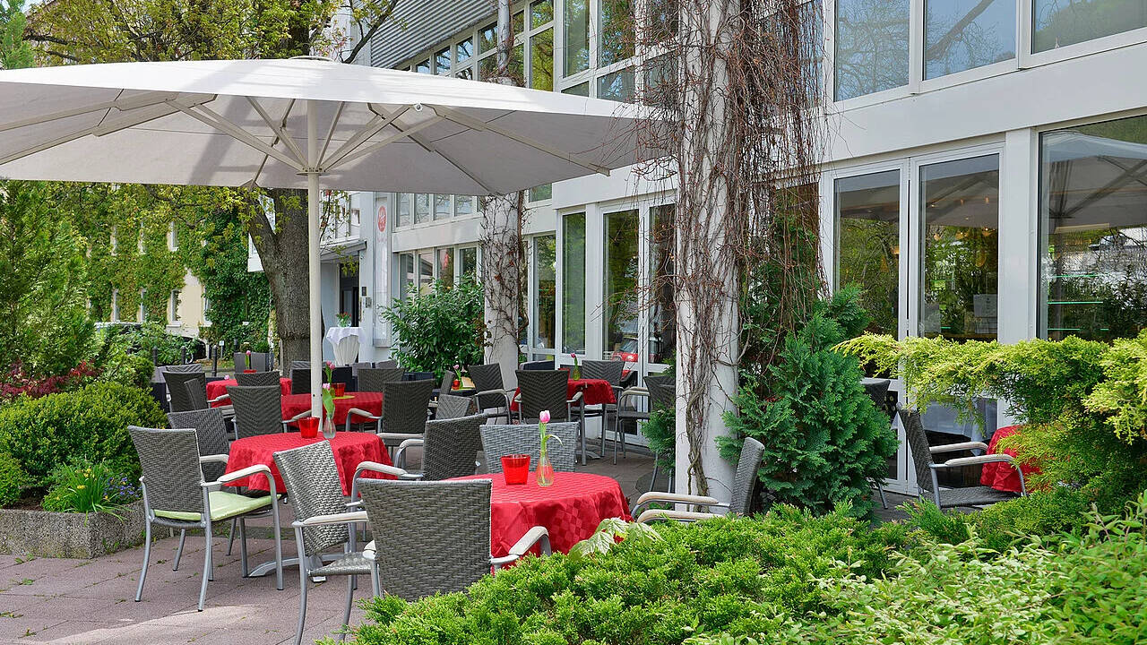 Enjoy a snack or coffee outdoors on the hotel’s inviting summer terrace.