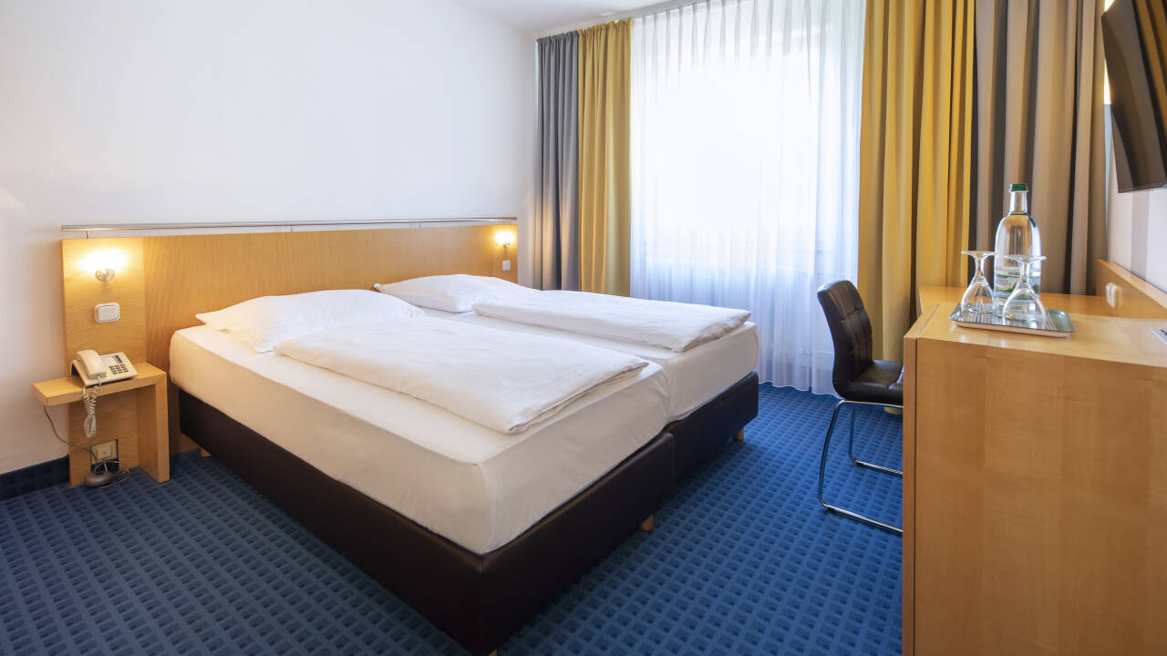 Settle into a comfortable room after a day of sightseeing.