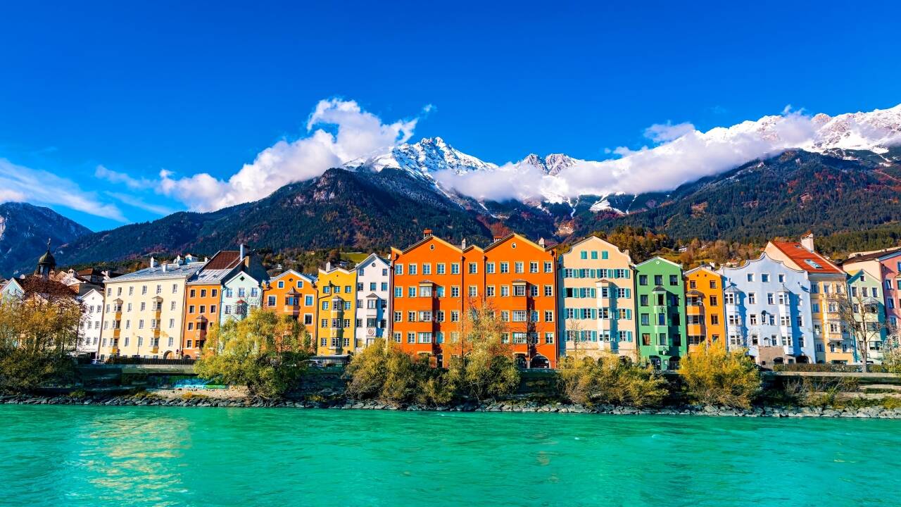 Take a day trip to Innsbruck for colorful riverside houses and historic streets.