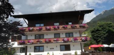Stay at Ferienhotel Der Tiroler, a cosy hotel with traditional Tyrolean character.