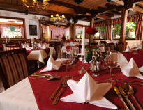 After a long day in nature, enjoy local specialities and good beer in the hotel's cosy restaurant