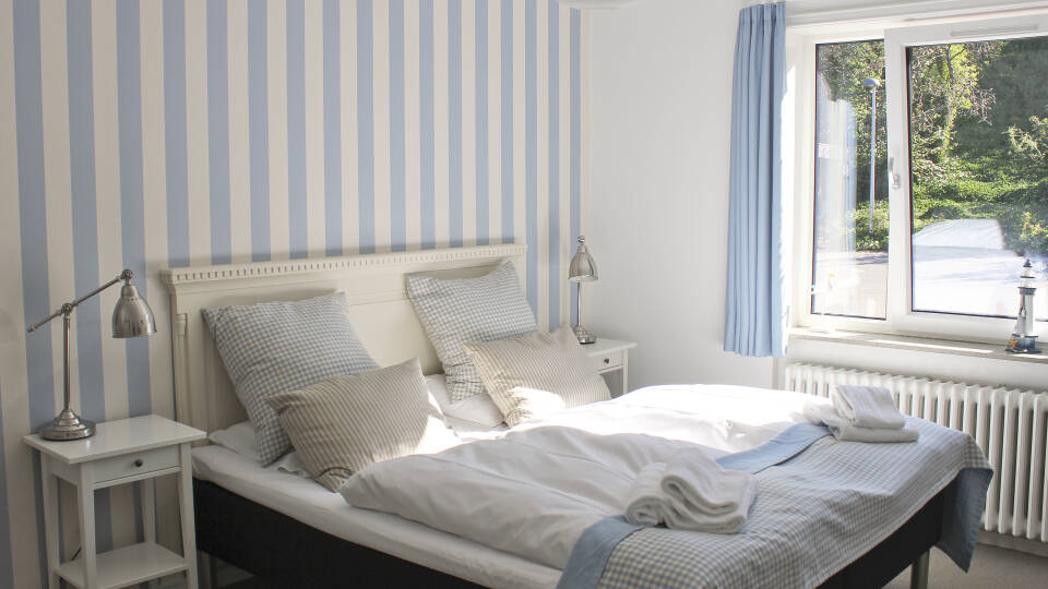 The individually decorated rooms evoke the seaside hotel style and offer a lovely setting for your stay