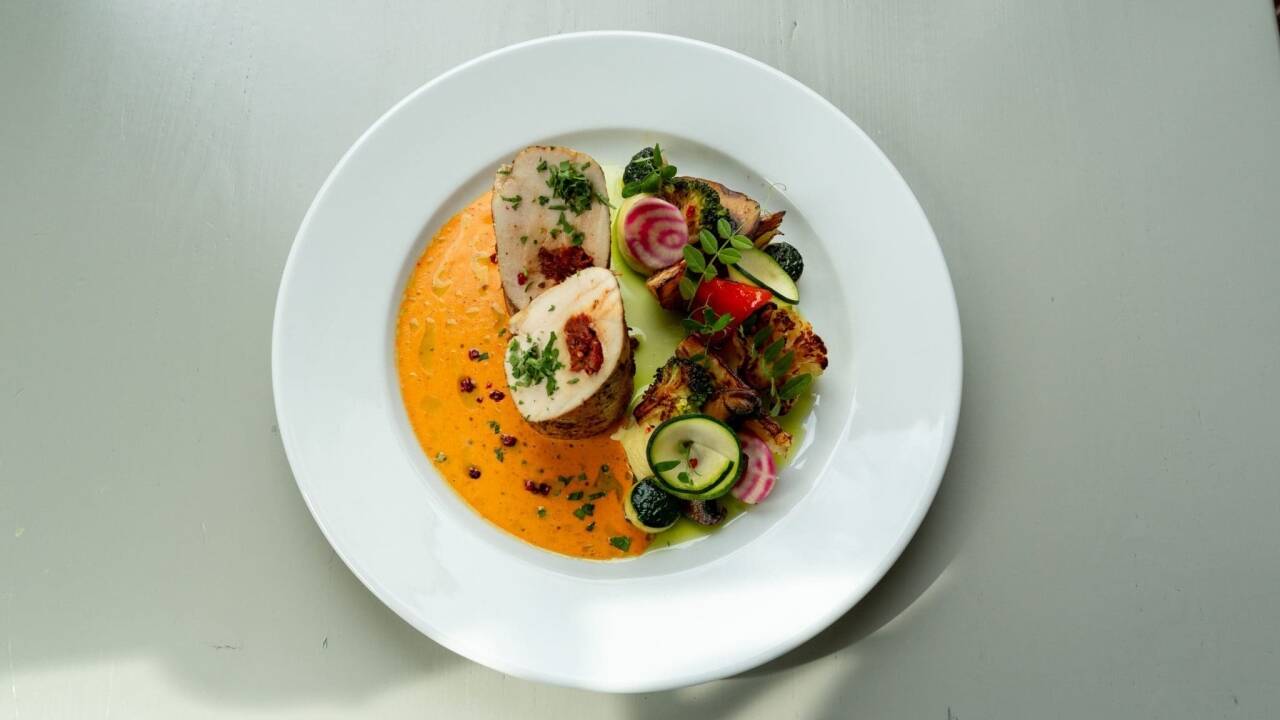 Dølen Eteri café and restaurant serves local food with terrace views over the water.