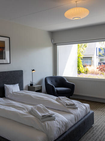 Njut av blandningen av historisk charm och moderna faciliteter i våra bekväma och eleganta rum.