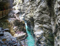 One of the deepest and longest gorges in the Alps, with impressive amounts of water gushing through.