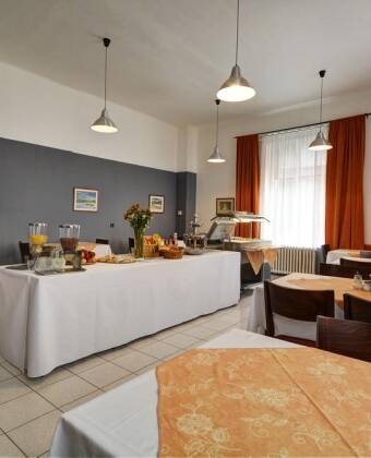 After a long day of sightseeing in Prague, enjoy authentic Czech delicacies and beer in the hotel restaurant.