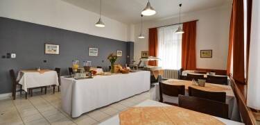After a long day of sightseeing in Prague, enjoy authentic Czech delicacies and beer in the hotel restaurant.