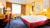 You'll stay in spacious rooms where you can get a good night's sleep after an eventful day in Dresden.