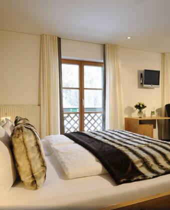 Stay in newly opened, modern rooms designed for comfort after active summer days.