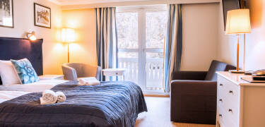 Nyt et avslappende miljø i det store, moderne og elegante dobbeltrommet.