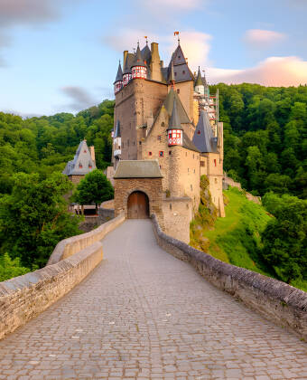 Visit Eltz Castle, one of the most beautiful castles in Germany. It is located in the Elz valley, which divides the Maifeld and Vordereifel.
