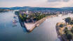 Koblenz is located at the confluence of the Rhine and Moselle rivers at Deutsches Eck.