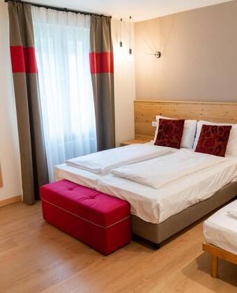The hotel has new apartments, decorated with light wood and natural elements.