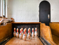The bowling alley from the 1930s is one of the oldest in Sweden and the original lanes, pins and bowling balls are still used.