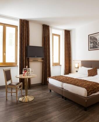 Relax in spacious, soundproof rooms with all the modern comforts you need.