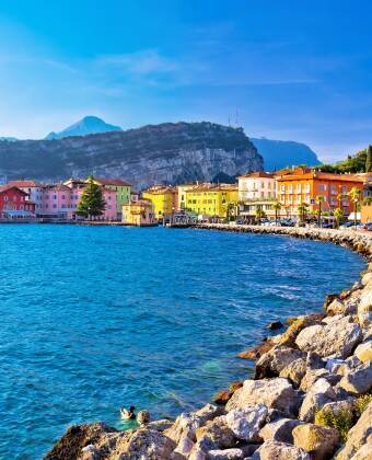 Riva del Garda is located at the northern end of Lake Garda and here you can really enjoy the beautiful surroundings on a walk along the lake shore.