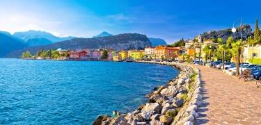 Riva del Garda is located at the northern end of Lake Garda and here you can really enjoy the beautiful surroundings on a walk along the lake shore.