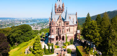 Visit the beautiful Schloss Drachenburg, located on the outskirts of Bonn. The castle enjoys an elevated position with a lovely view.