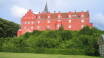 Besök det vackra Tranekær Slott och Slottsmuseum, som ger indblick i slottets långe historia.