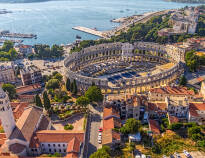 Visit the city of Pula with the famous amphitheatre, where bloody battles were fought and today concerts and the like are held.