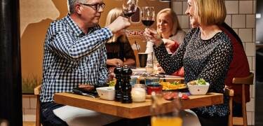 Dine and enjoy a glass of wine at Jensens Bøfhus