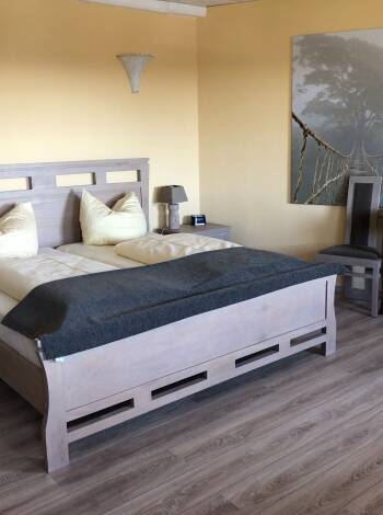 Example of a double room. The room has a touch of the East and a cosy decor.