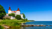 Machen Sie einen Familienausflug zum wunderschönen Schloss Läckö, das sich auf einem Felsvorsprung am Vänernsee befindet.